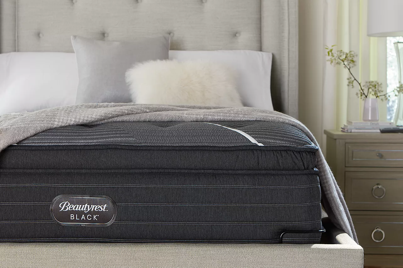 A Simmons K-Class Mattress in a room scene.